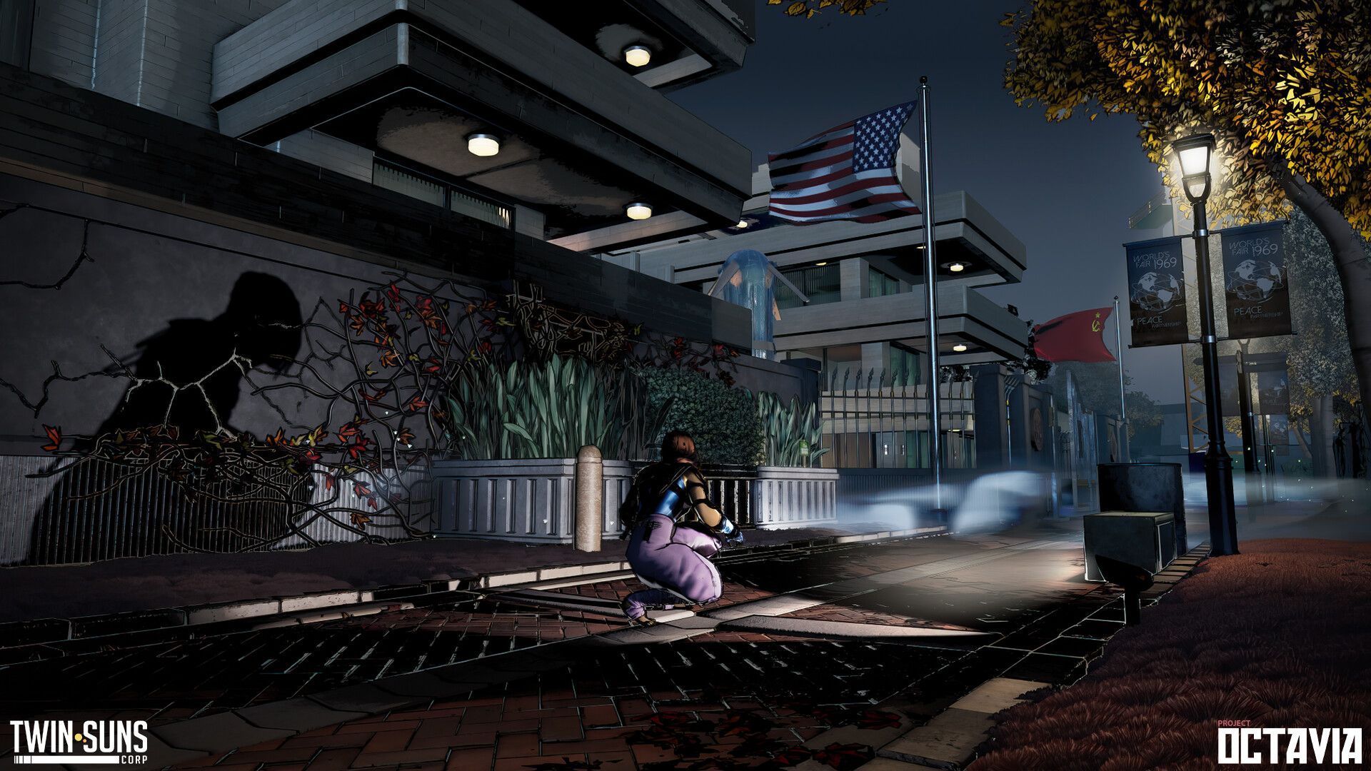 An agent crouches by a wall outside a government building at night