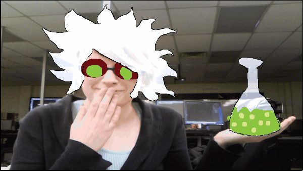 A person wearing drawn-on goggles and hair, holding a cartoon flask